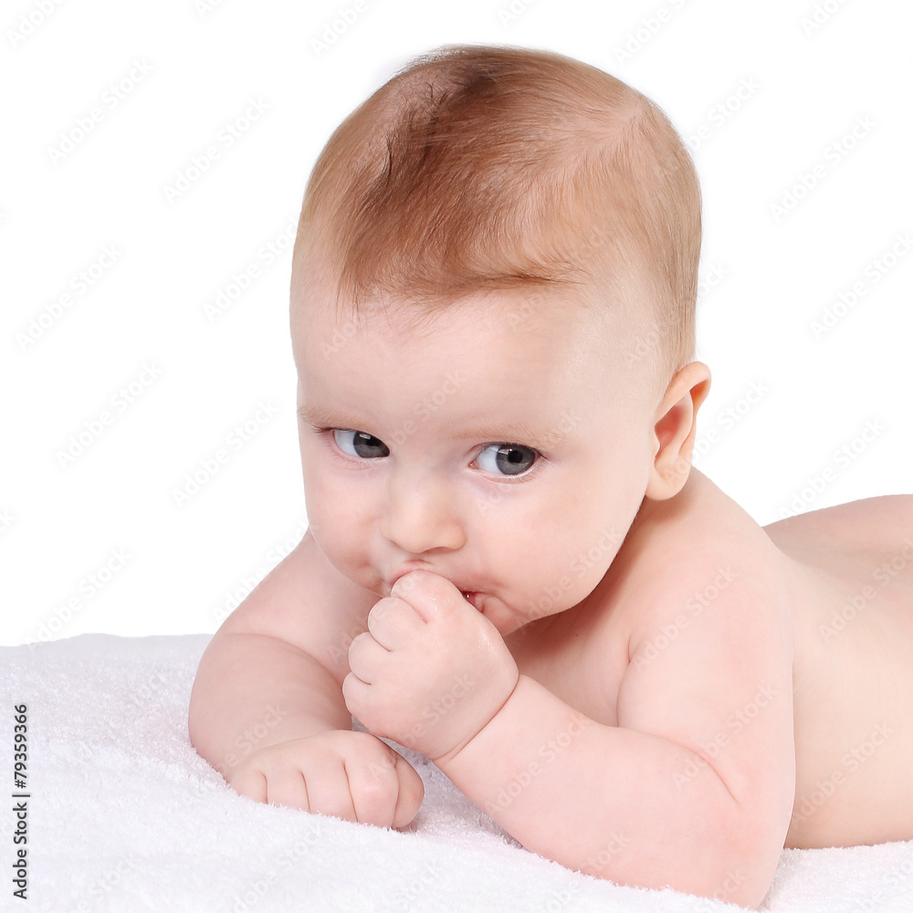Naked child sucks his thumb. A sweet child. Naked child sucks his thumb. A sweet child.