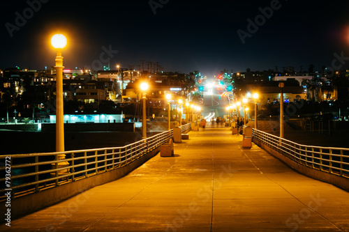 The pier and view of Manhattan Beach Boulevard at night, in Manh photo