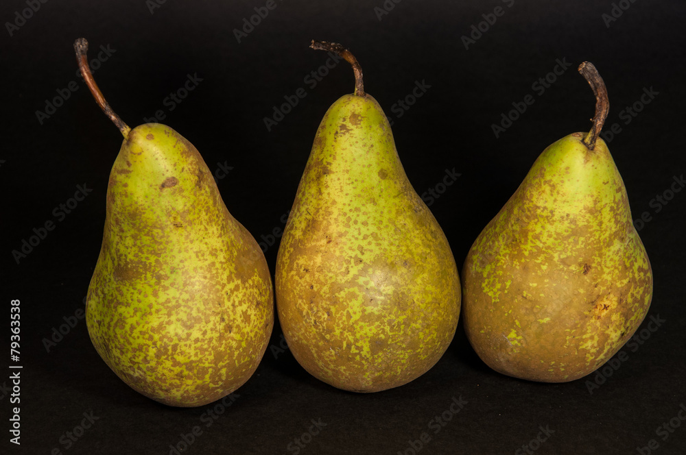 Green pears isolated from black background Green pears isolated from black background