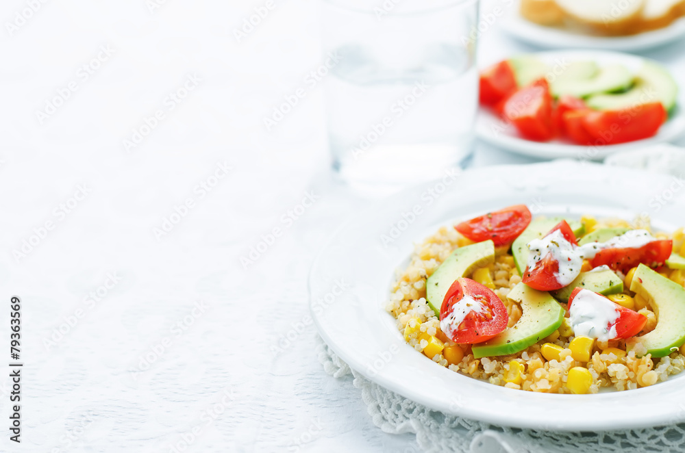 salad with quinoa, red lentils, corn, avocado and tomato with yo salad with quinoa, red lentils, corn, avocado and tomato with yo