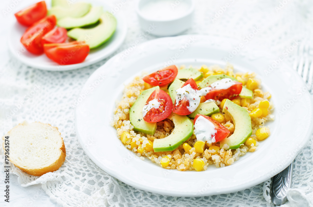 salad with quinoa, red lentils, corn, avocado and tomato with yo salad with quinoa, red lentils, corn, avocado and tomato with yo