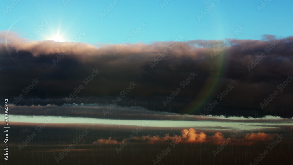 Beautiful skyscape. The sun behind the clouds, the rain. Beautiful skyscape. The sun behind the clouds, the rain.