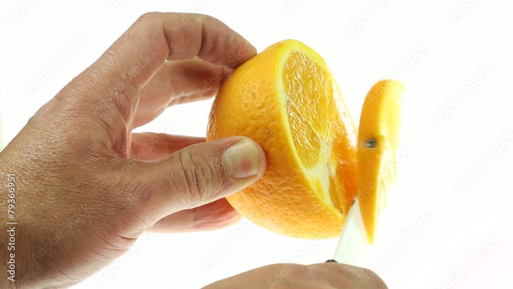 slicing an orange