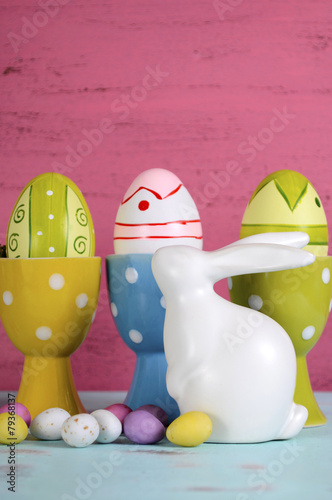 Easter eggs in polka dot egg cups  photo