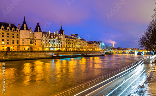 The Conciergerie and the Seine river in Paris - France