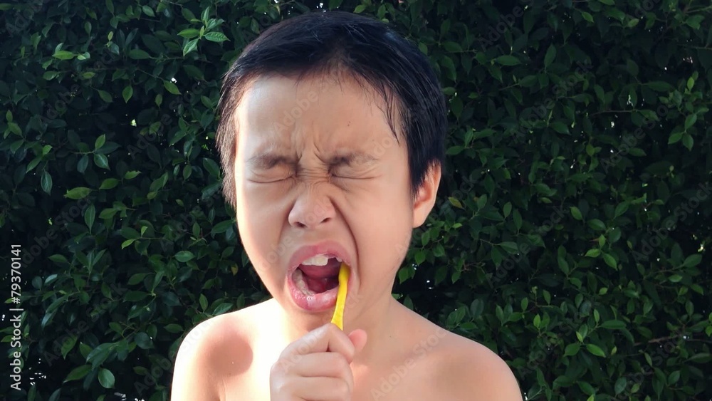 Close up boy teeth brushing Close up boy teeth brushing
