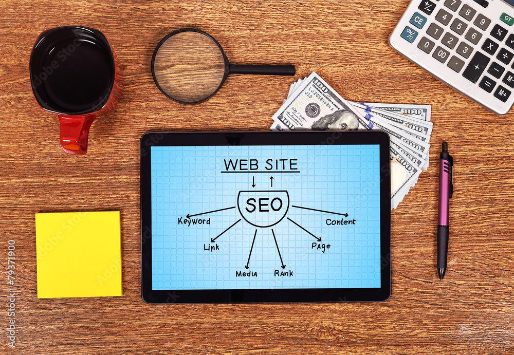 Naklejka premium tablet with seo scheme