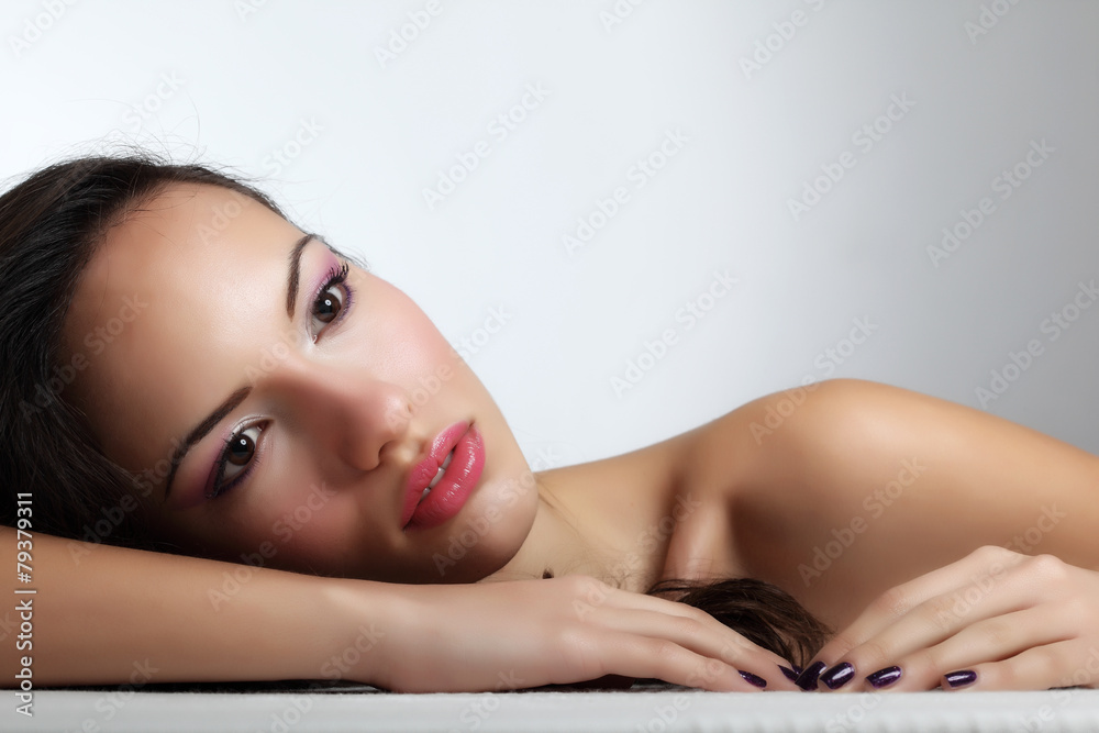 Obraz premium Portrait of young beautiful woman with fashion makeup