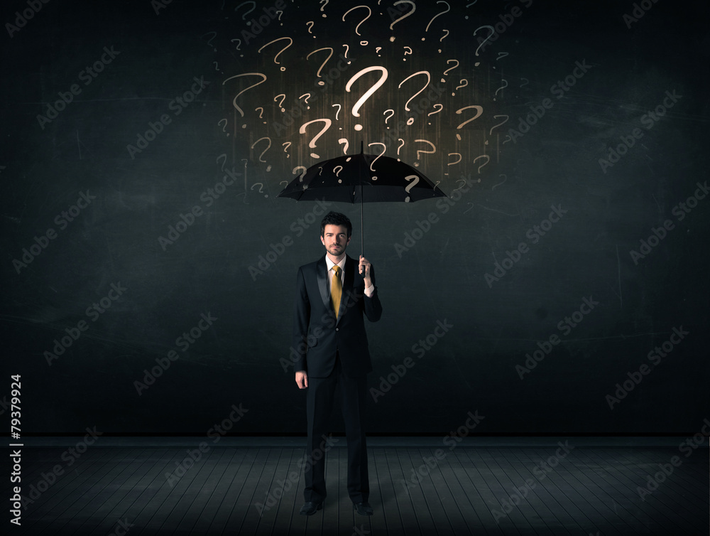 Businessman with umbrella and a lot of drawn question marks Businessman with umbrella and a lot of drawn question marks