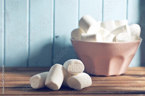 white marshmallows on wooden table