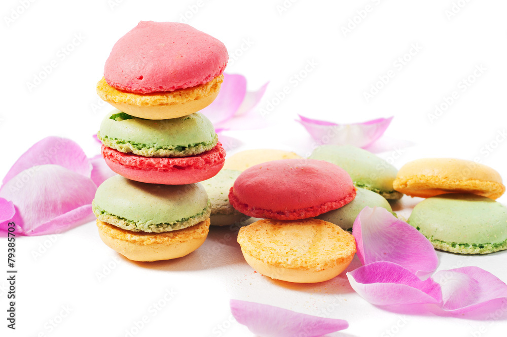 Macaron cookies and pink rose petals