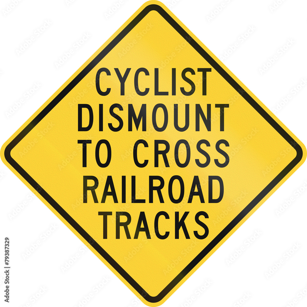 US warning traffic sign: Cyclists dismount to cross railroad tracks US warning traffic sign: Cyclists dismount to cross railroad tracks