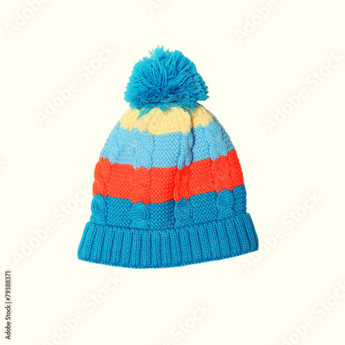 Bright knitted hat on a white background