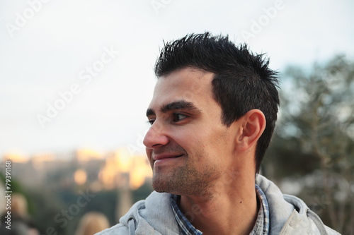 Smile young greekman outdoor.In Europe,Athens,Greece.