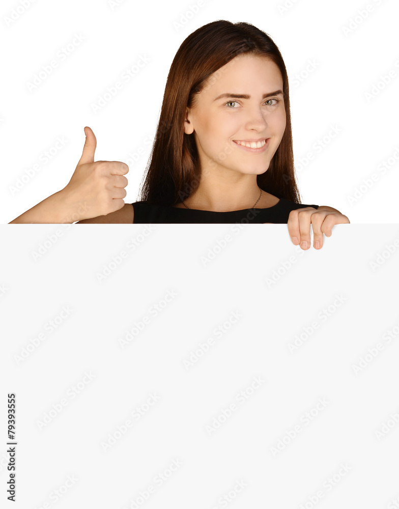 Business woman showing thumb up and holding a blank banner. Business woman showing thumb up and holding a blank banner.