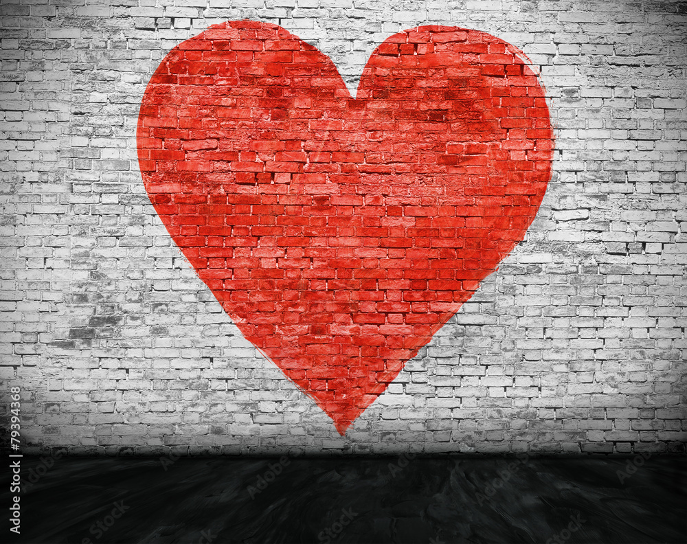 Heart painted on brick wall