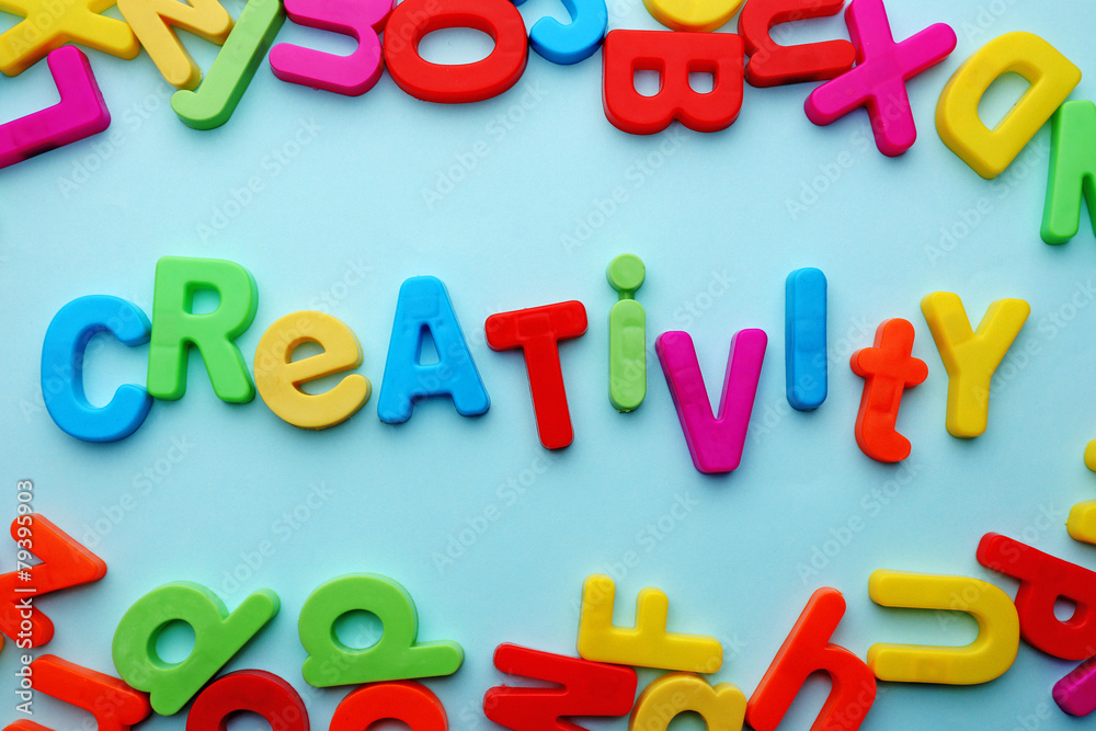 Fototapeta premium Creativity motto by alphabet letters on colorful background