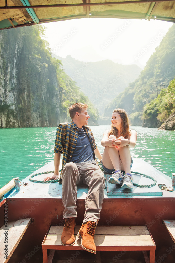 couple traveling by boat