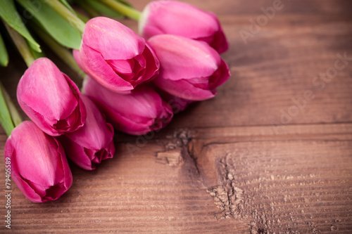 Fototapeta Naklejka Na Ścianę i Meble -  Tulips flowers on wooden table