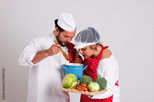 Italian Culinary Couple is Tasting Vegetable Soup photo