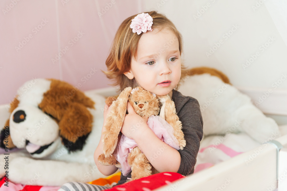 Interior portrait of a cute toddler girl in her room Interior portrait of a cute toddler girl in her room