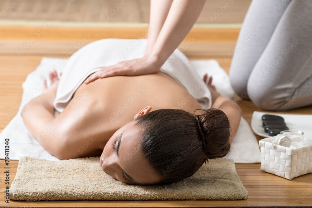 Woman Receiving Back Massage in Spa Center - obrazy, fototapety, plakaty 