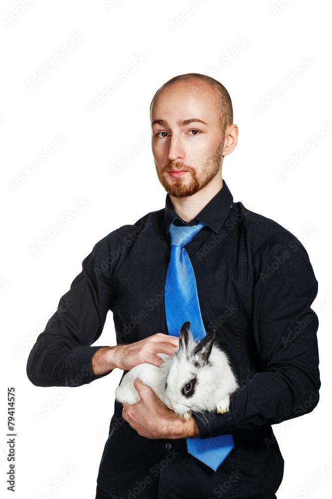 Businessman holding a rabbit Businessman holding a rabbit