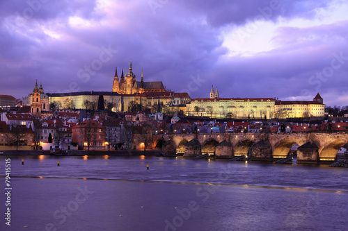 Prague gothic Castle and Charles Bridge after sunset