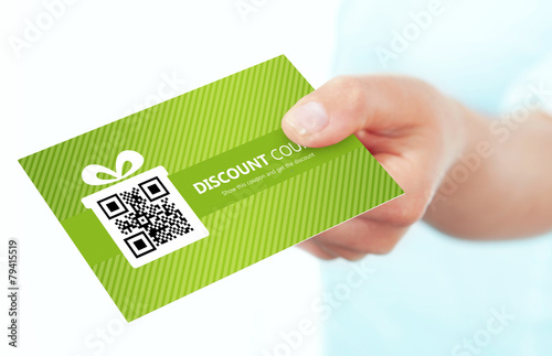 hand holding spring discount card isolated over white