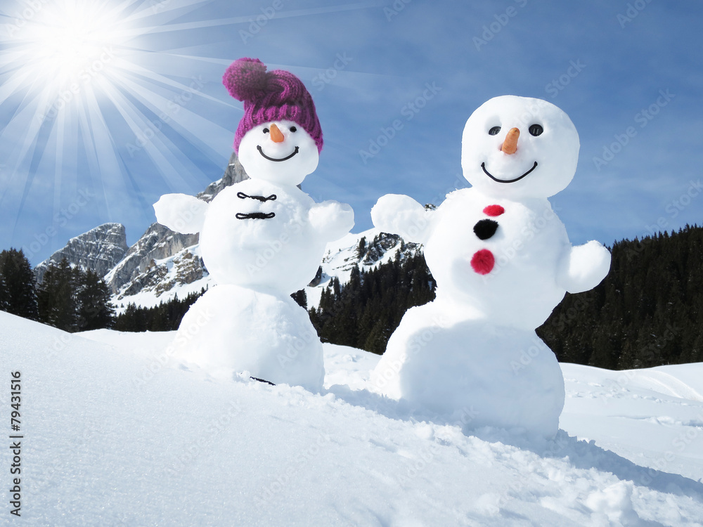 Two funny snowmen in the Alps Two funny snowmen in the Alps