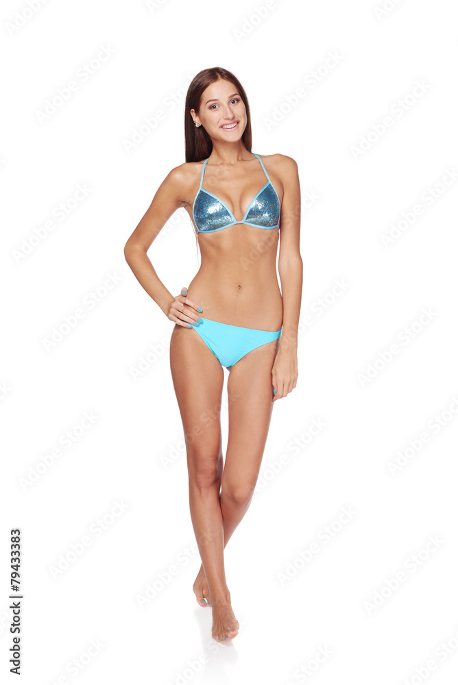 Slim tanned woman in blue bikini Slim tanned woman in blue bikini