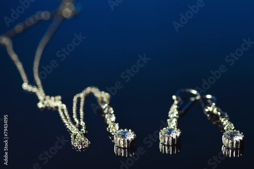 Bridal earrings and silver chain with reflection