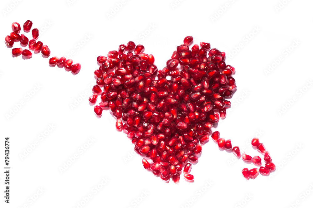 An image of a heart of pomegranate seeds