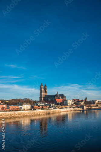 Beautiful cathedral of Magdeburg, river Elba and old town in the