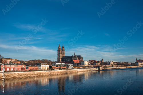 Beautiful cathedral of Magdeburg, river Elba and old town in the © neurobite