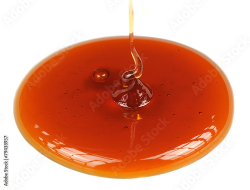 Dripping Honey on White Background