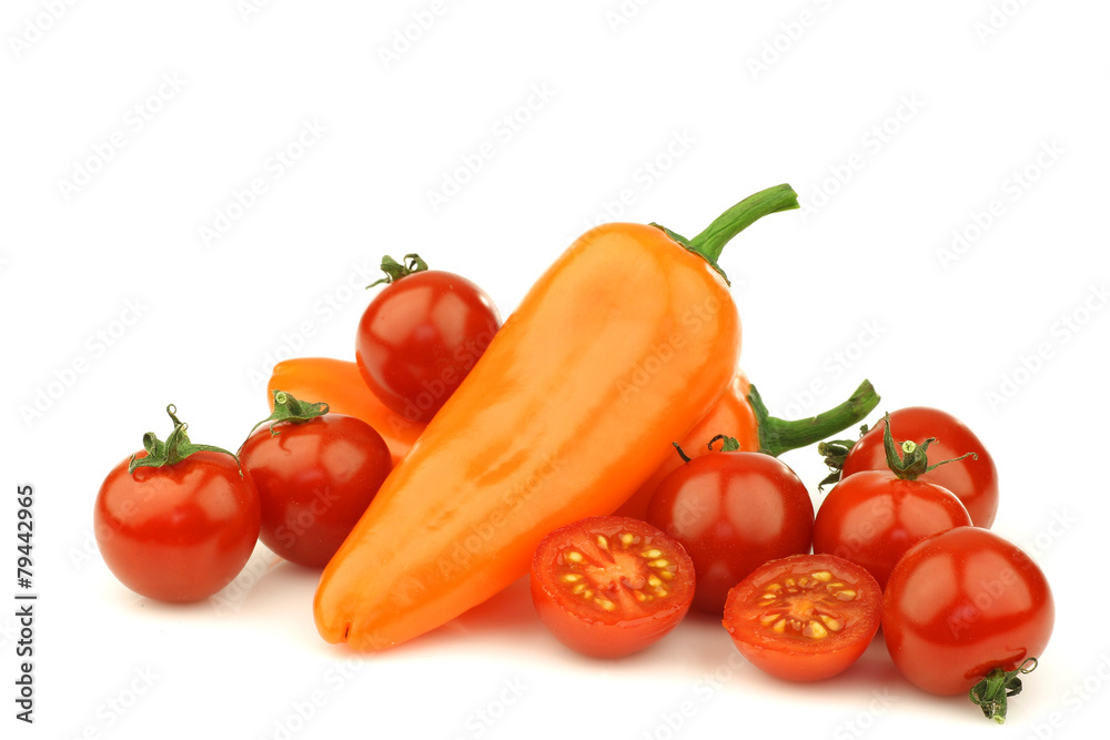 fresh cherry tomatoes and two orange peppers (capsicum)