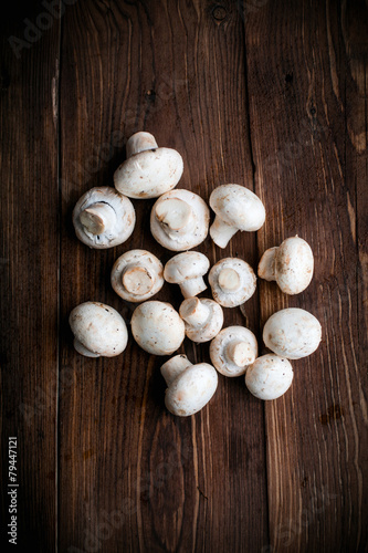 White mushrooms on wood table
