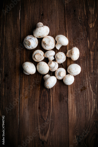 White mushrooms on wood table