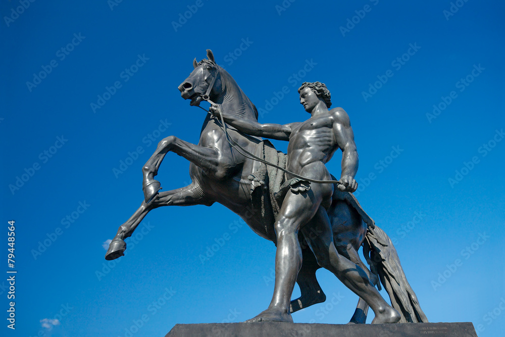 Sculpture of Horse Tamer, Anichkov bridge, Saint Petersburg, Rus Sculpture of Horse Tamer, Anichkov bridge, Saint Petersburg, Rus