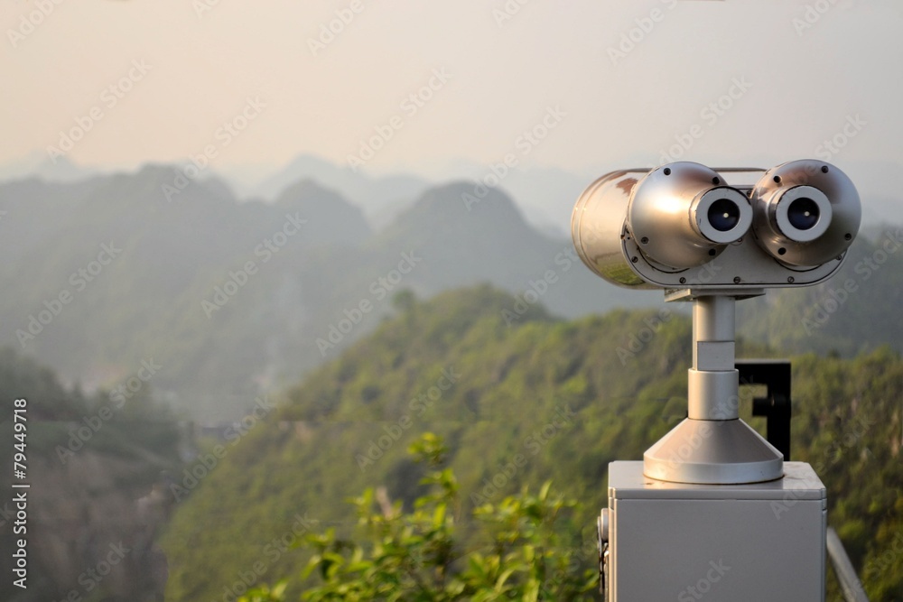 Scenic lookout binoculars Vietnamese island Cat Ba