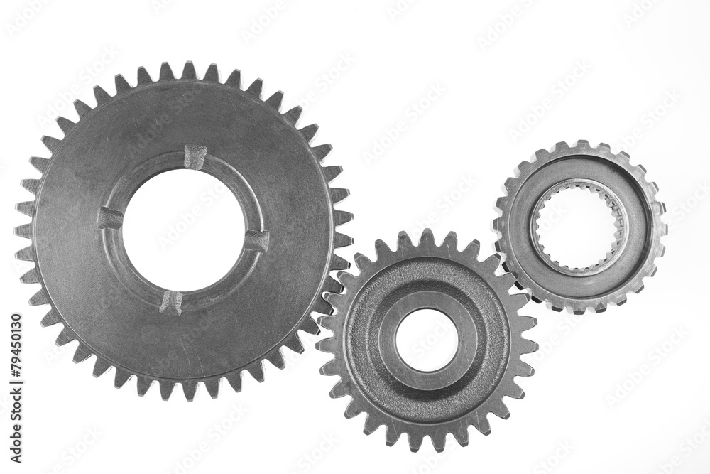 Three steel cog gear isolated on white. Three steel cog gear isolated on white.