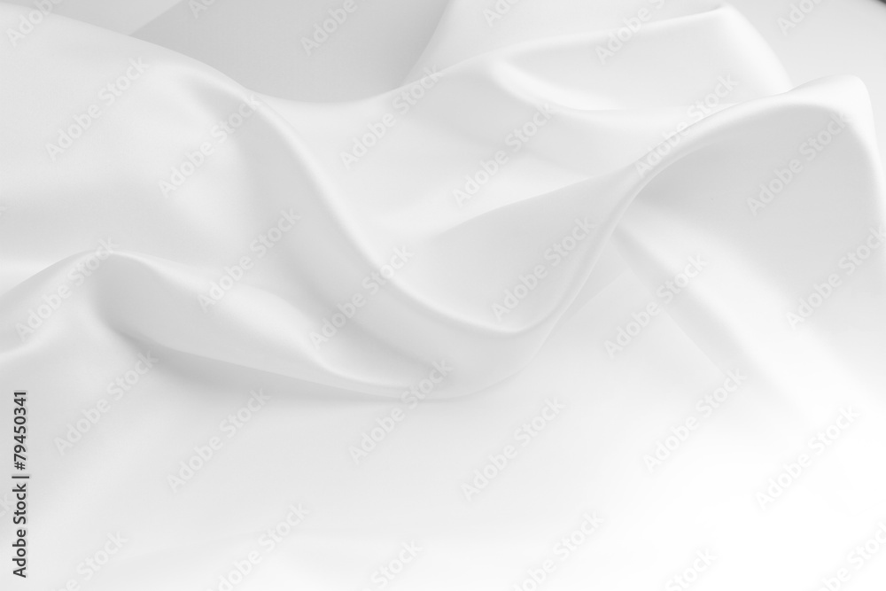 Obraz premium White silk fabric material texture background. Copy space