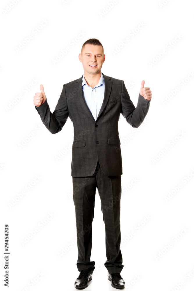 Young businessman gesturing ok sign Young businessman gesturing ok sign