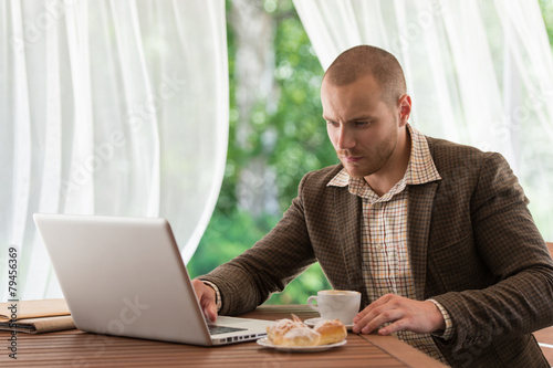 Business man working on his laptop