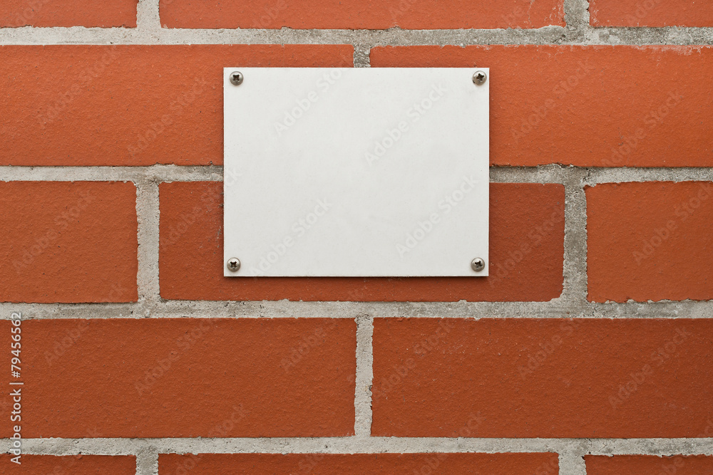 custom made wallpaper toronto digitalEin leeres weisses Schild auf einer roten Ziegelwand