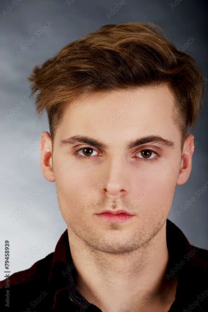 Fototapeta premium Young serious man.