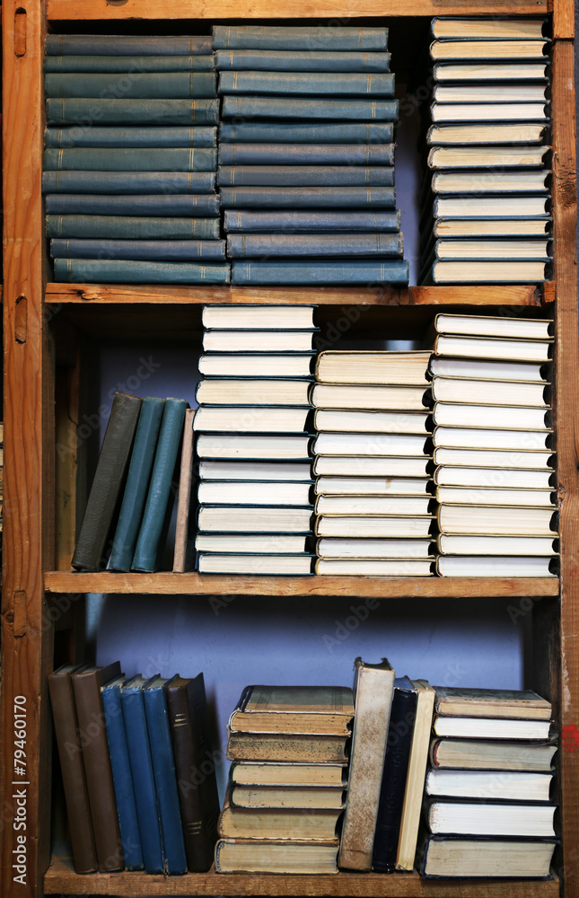 Many books on bookshelf in library Many books on bookshelf in library