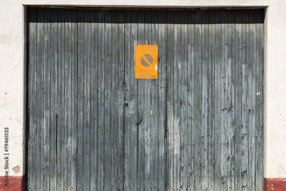 Close up view of an old wooden warehouse door. Close up view of an old wooden warehouse door.