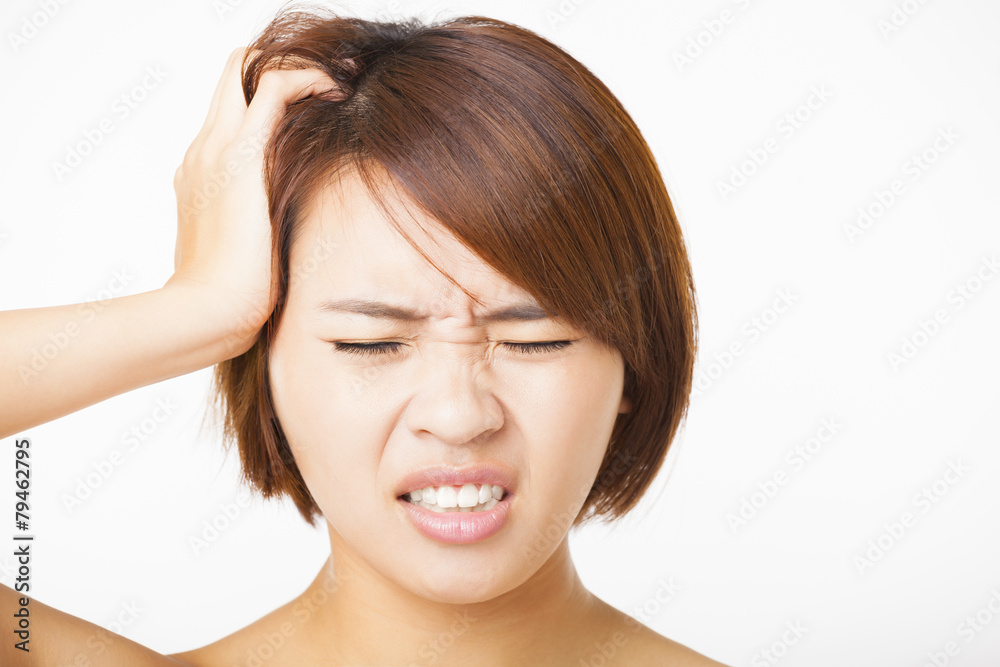 Closeup   young woman  with headache